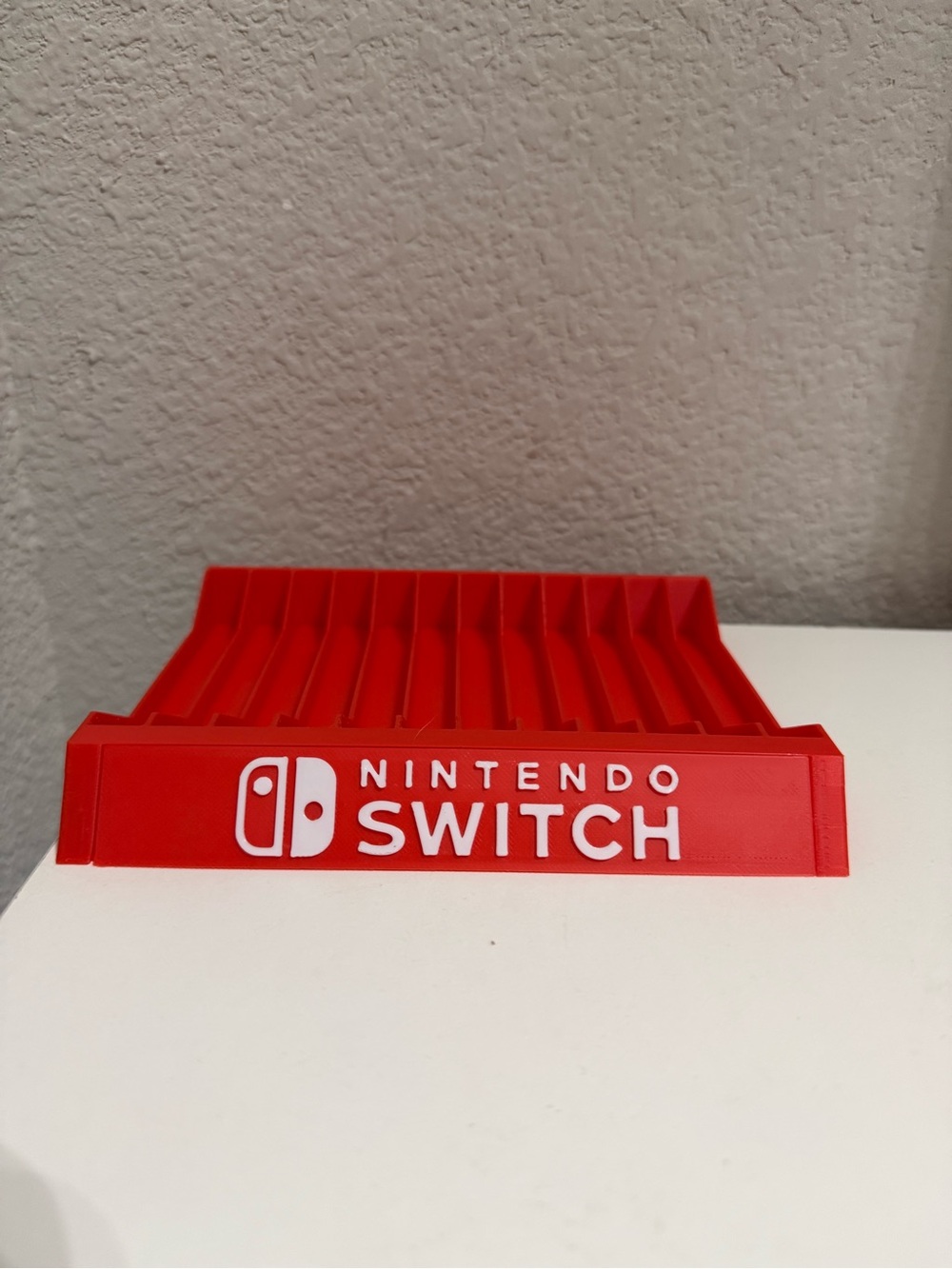 Nintendo Red Switch Game Rack with Logo - Picture 1 of 2